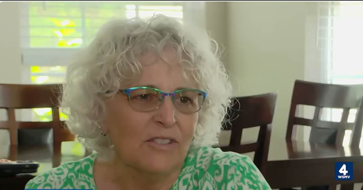 Woman finds hidden compartment in suitcase she bought for $10 at a yard sale. What she found made her call the cops instantly