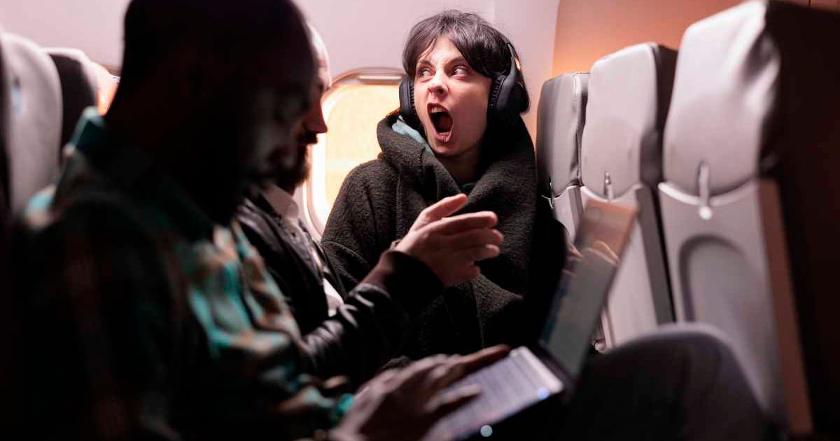 Two large men tried to intimidate a petite, disabled woman into giving up her airline seat — her response had the entire cabin staring at them