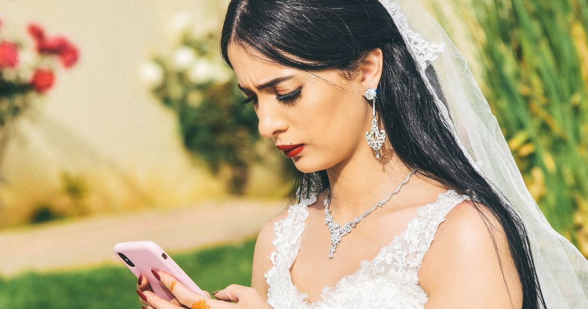 Bride was baffled when the groom's best friend mocked her 'fake' wedding and 'baby shower cake' — until one text exposed why