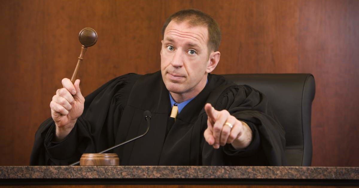 Man trying to cut off his 18-year-old daughter's insurance kept looking off-camera in court. The judge saw who was ‘coaching’ him — and called it out