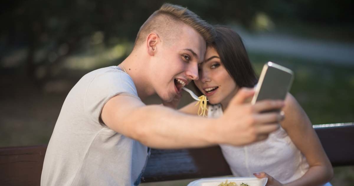 She posted a 'romantic' montage with a guy she'd just met in Puerto Rico — but a couples photo in the comments stole everyone's attention