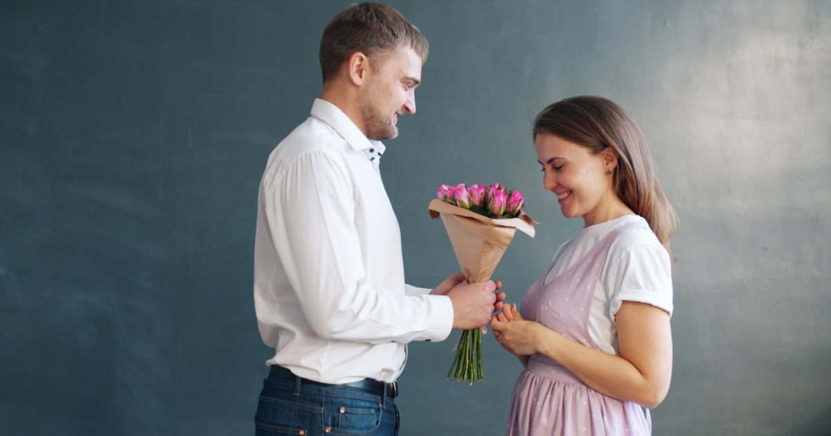 Coworker accused him of flirting with his secret girlfriend over a bouquet of flowers. One problem: they both knew he was gay