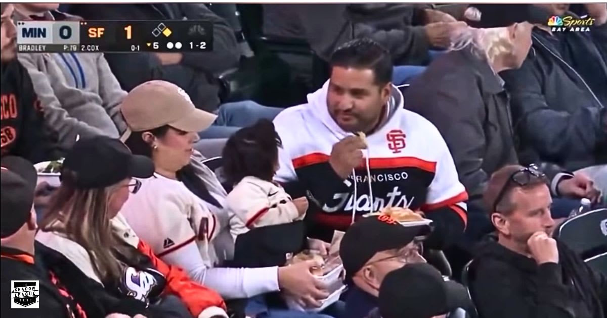 Broadcasters mocked dad for eating as wife juggled a baby and 3 food trays. Now the viral mom is telling her side