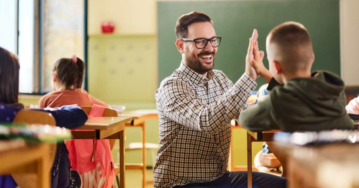 Students discovered their teacher was in a band. Then they learned his song and surprised him mid-class