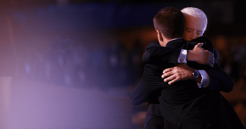 As Biden gave his inaugural speech, an unknown uniformed man stood watch over his son Beau's grave