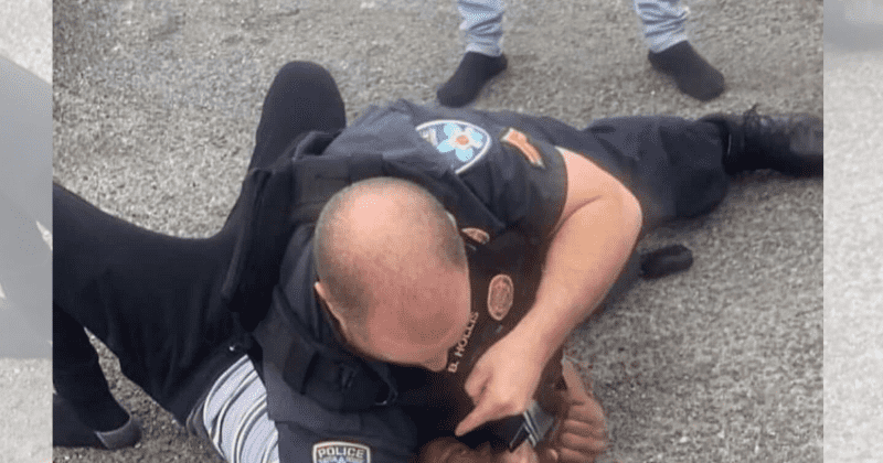 Baton Rouge officer under investigation after being filmed restraining Black teen in a chokehold