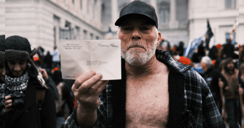Capitol Hill rioter who put feet up on Pelosi's desk throws tantrum in court, shouts at judge