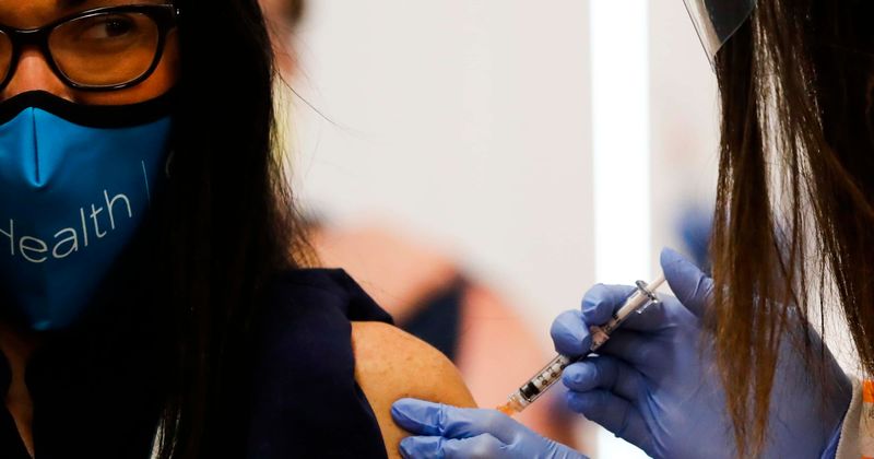 It's important to wear masks in many places even after getting vaccinated. Here's why