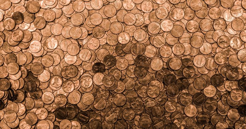 Autoworker receives final paycheck in the form of 91,500 oily pennies dumped in his driveway