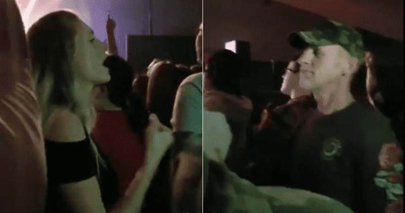 Daughter signs for her deaf dad at rock concert