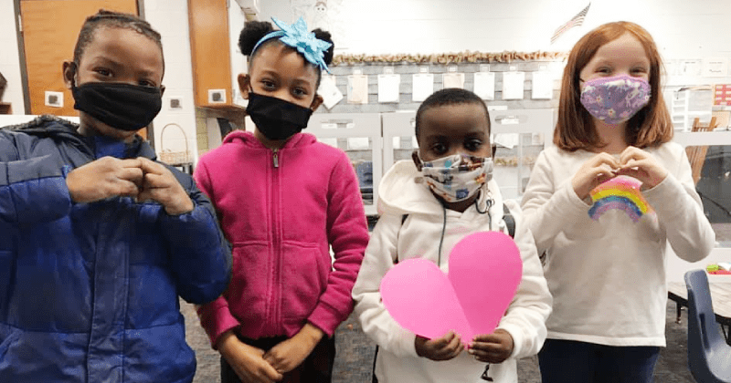Students are selling paper hearts to raise money for first grader friend who needs a heart transplant