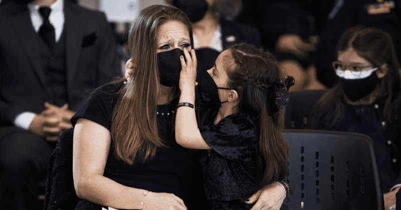 Slain Capitol police officer's daughter wipes away mom's tears during emotional memorial