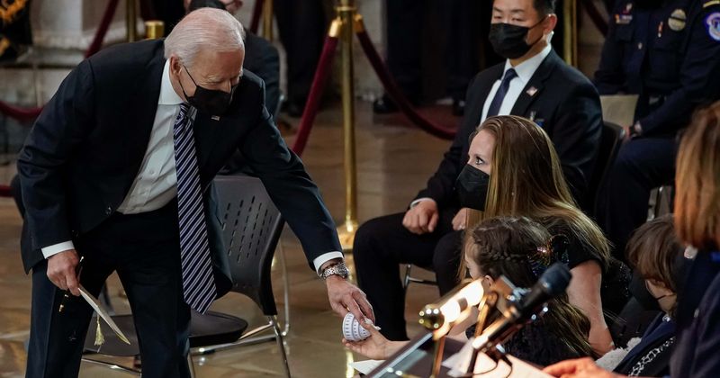 Biden returns a toy dropped by slain Capitol officer's daughter in sweet moment during memorial