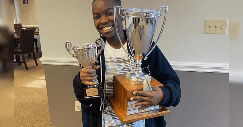 Formerly homeless Nigerian refugee is now a chess national master at the age of 10