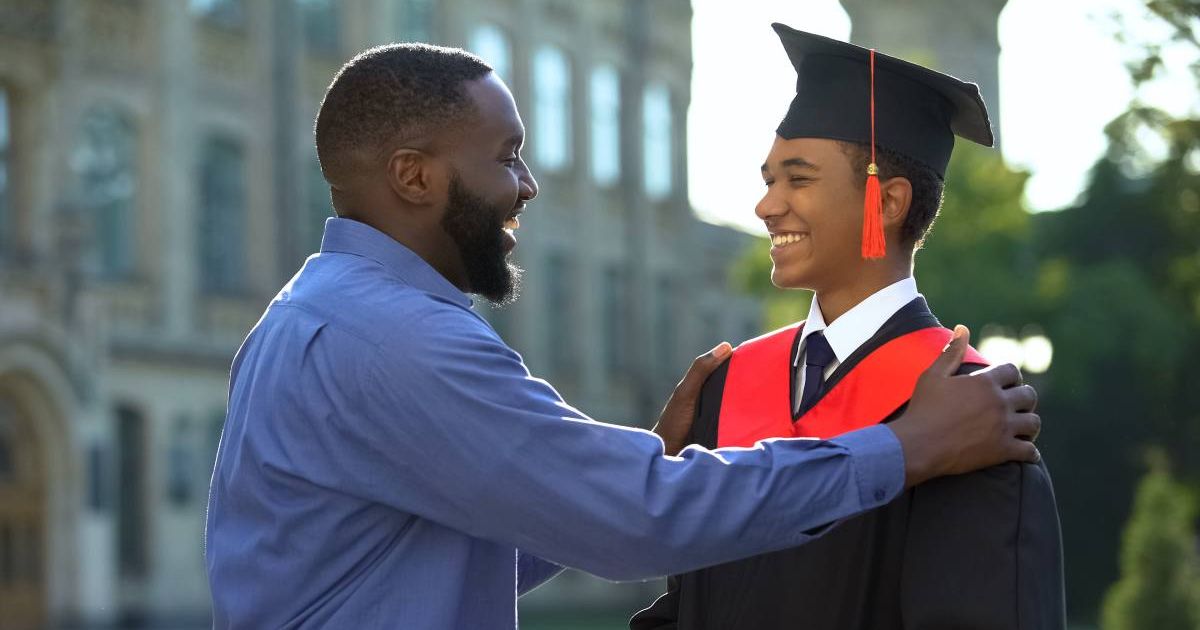 A student was stopped from walking at graduation because of his shoes. So a teacher stepped in.