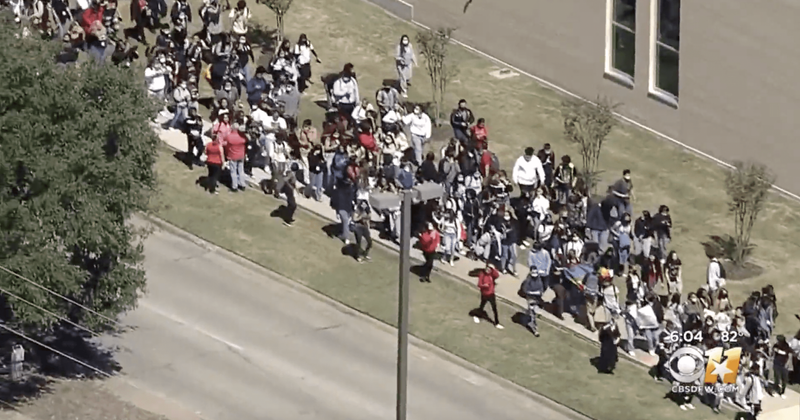 Hundreds of students walk out in protest after school takes down LGBTQ 'safe space' stickers