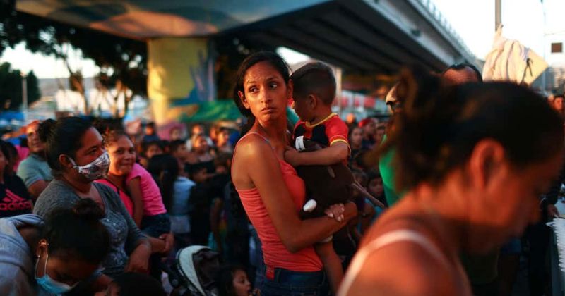 A pastor evicted nearly 200 migrants. So, his brother welcomed them all home.