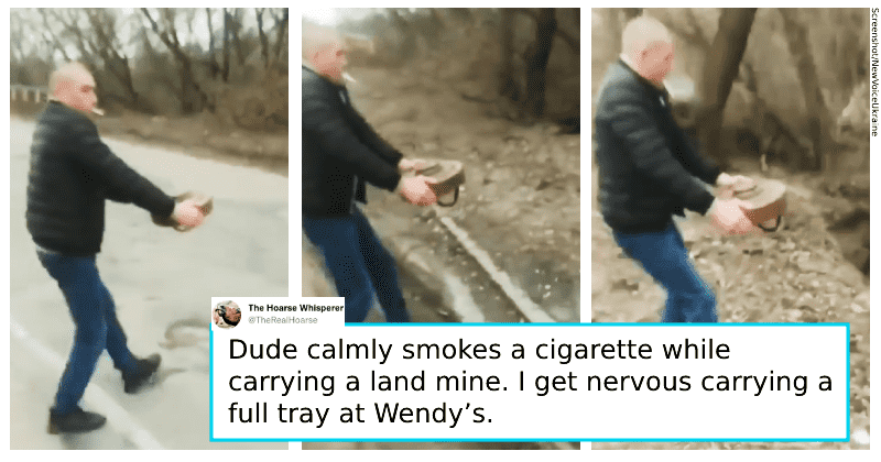 Ukrainian calmly removes landmine from road with bare hands while smoking a cigarette