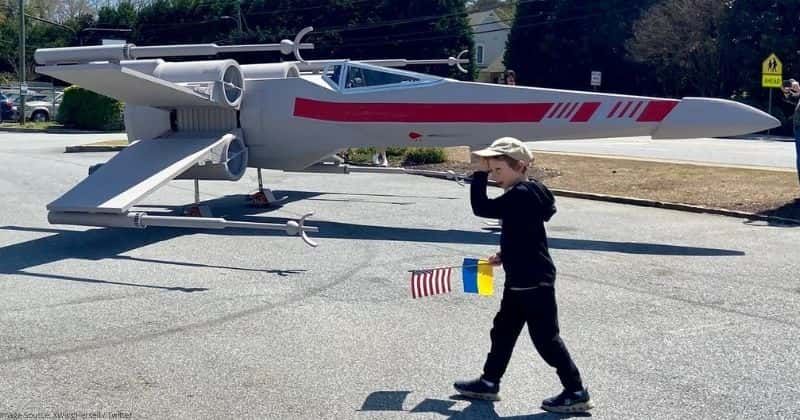 He built a moving, life-sized 'Star Wars' X-wing fighter. Now, he's using it to help Ukraine.