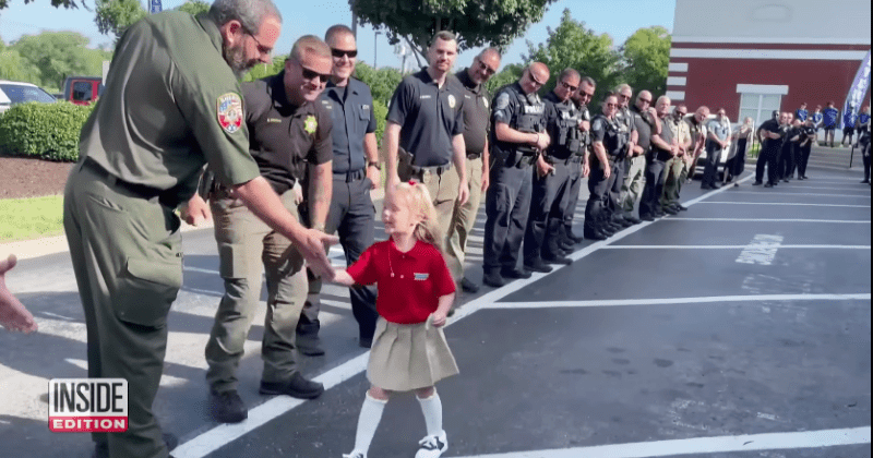 Daughter of fallen cop gets police escort to first day of kindergarten so she doesn't feel alone