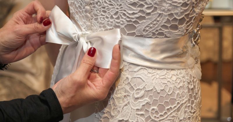 A 72-year-old 'lucky' gown has been worn by eight brides across three generations in this family