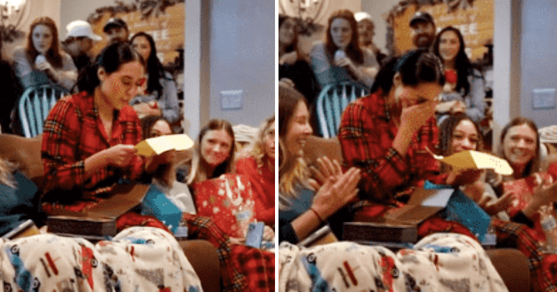 Moment volleyball star is surprised with full college scholarship in white elephant gift exchange