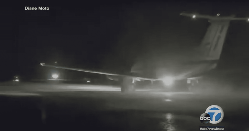 Alaskan residents use their vehicles to light up the dark runway to help a medevac flight land 