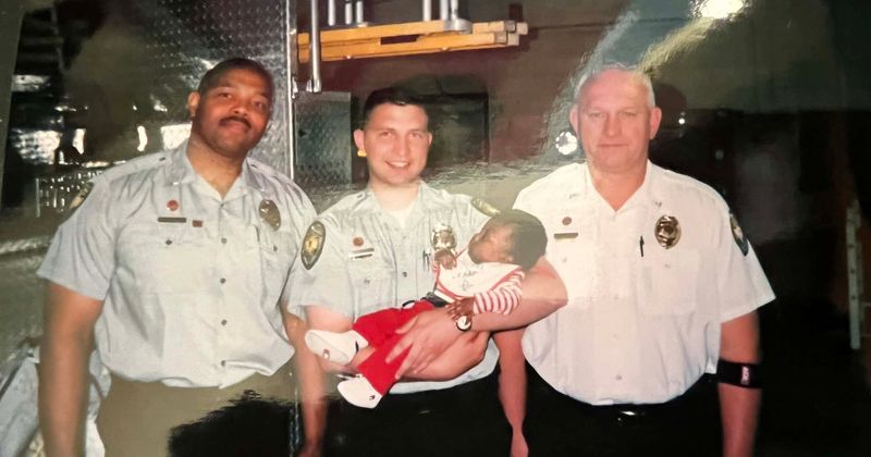Firefighters reunite with baby they brought into the world 22 years ago
