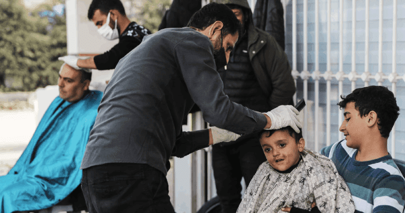 Teenager gives free open-air haircuts to Turkey earthquake survivors