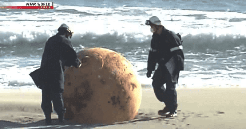 Giant metal ball appeared on a beach in Japan and no one knows what it is