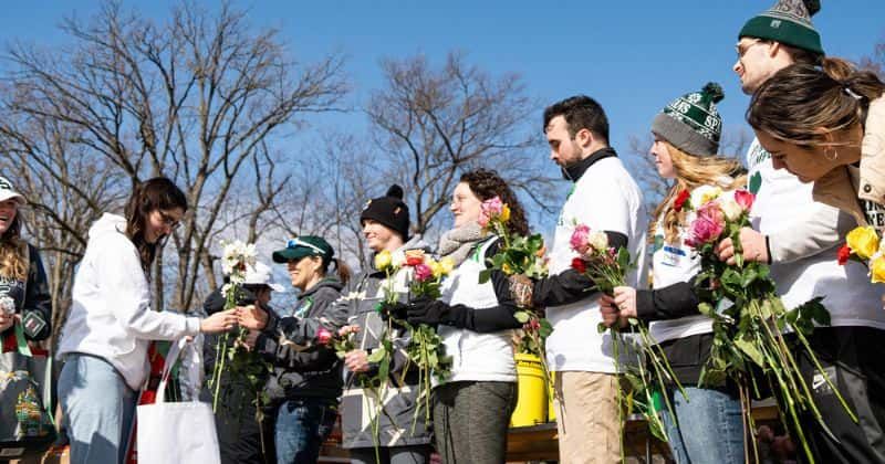Moms lined up to hug students returning to Michigan State University after the deadly shooting