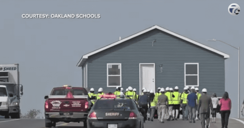 Students construct and deliver house by truck, providing affordable housing for low-income families