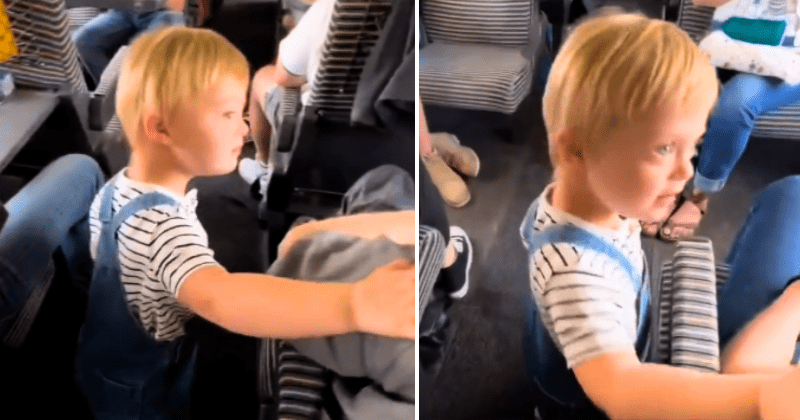 Adorable child with Down Syndrome checks in on all his fellow passengers during train journey