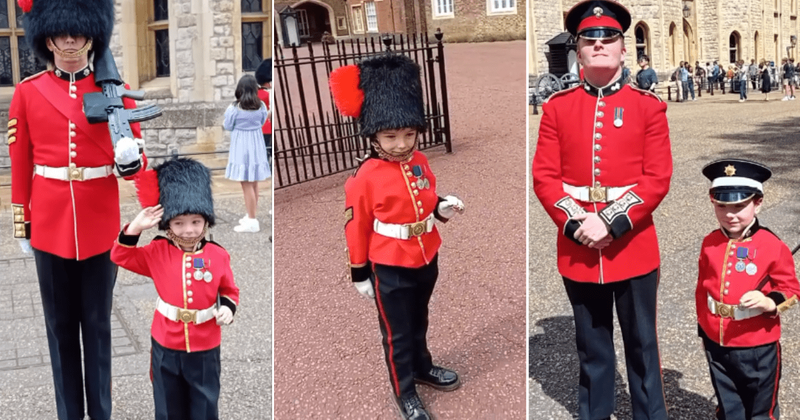 Royal guards adorably acknowledge young boy saluting them while being dressed as a soldier