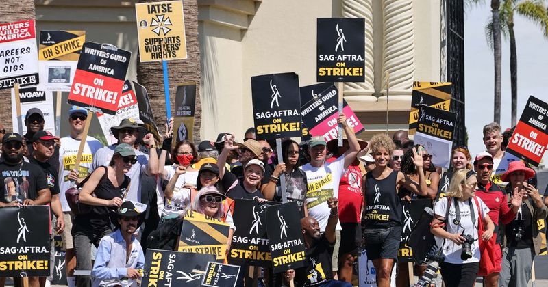 Hollywood writers agree to end five-month strike after reaching a tentative studio agreement