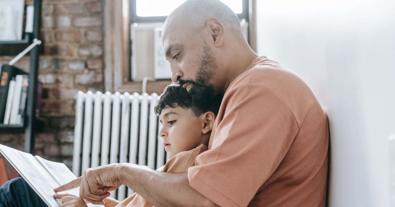 School district celebrates 'Dads Take Your Child to School Day' to support fatherhood engagement