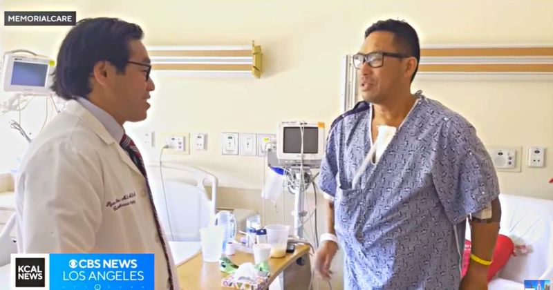 Runner suffering cardiac arrest at marathon spotted and miraculously saved by heart surgeon