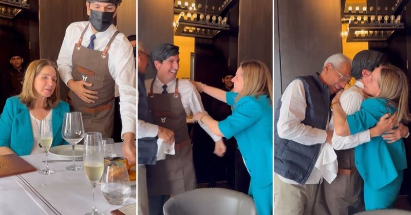 Parents celebrating 50th anniversary have a joyous reaction when surprised by a special waiter