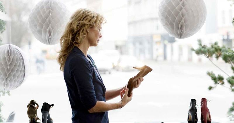 Entitled woman gets instant karma after throwing shoe at customer she mistook for staff