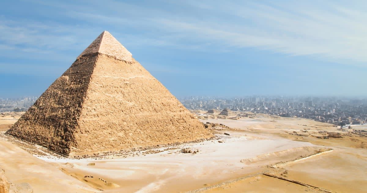 Man paragliding over Pyramids of Giza stunned when he spots something moving at the top