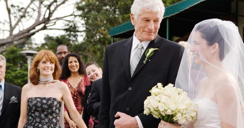Bride's dad gets a surprise when he asked to walk her down the aisle with adoptive dad
