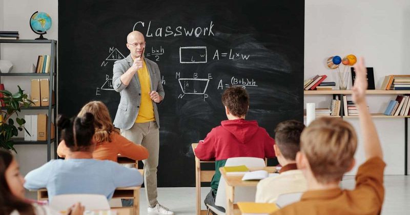 Students asked janitor to enter the classroom with her eyes closed — and then gave her a 'sweet' surprise
