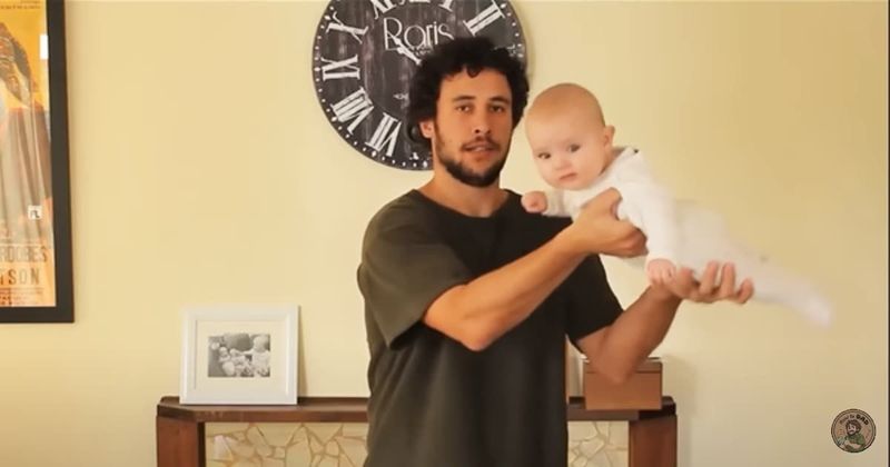 Viral dad who taught us 'how to hold a baby' shares adorable 10th anniversary update