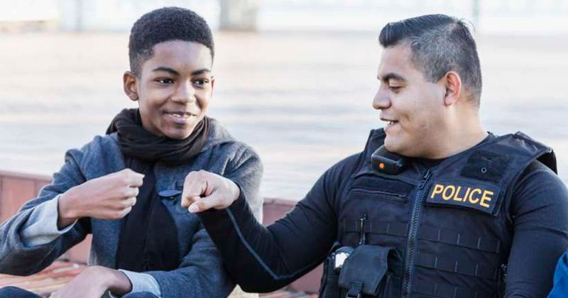 Bullied 9-year-old was heartbroken when no one came to his birthday — until local police walked in with a surprise