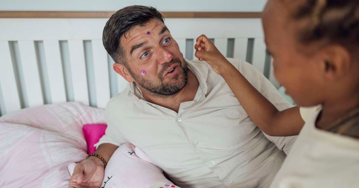 Daughter covers her dad’s arms in stickers — each one with a special meaning. Now he refuses to take them off, even for work meetings