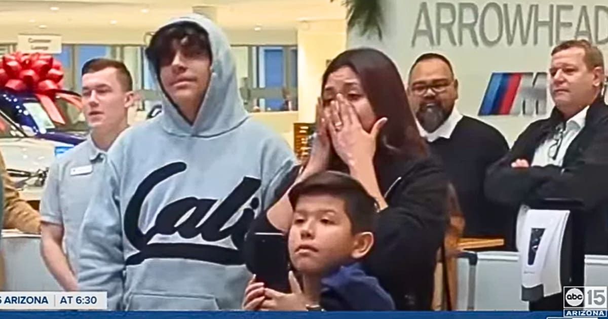 Woman caring for three younger brothers thought she was volunteering at BMW. When she realized it was a gift for her, she bawled