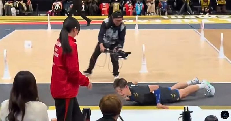 Volleyball player accidentally hits a judge but his immediate reaction leaves her smiling