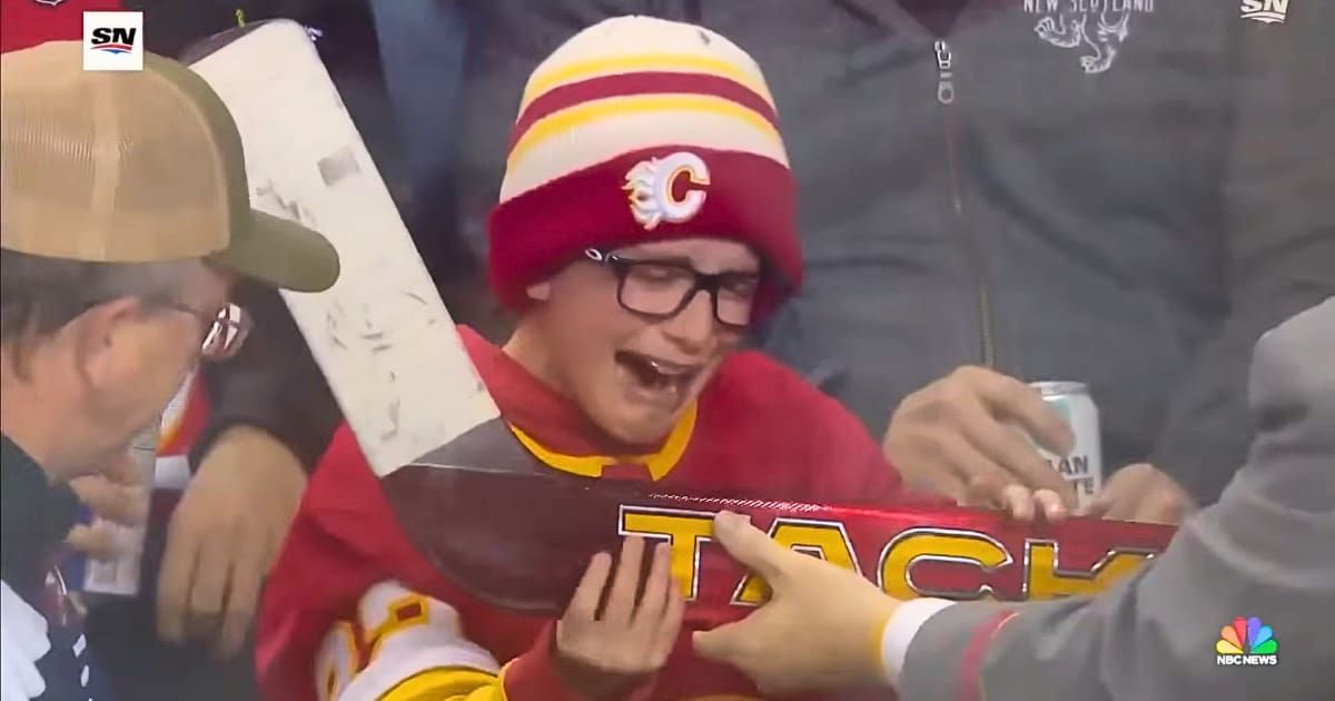10-year-old 'goalie' brought a handmade sign for his NHL hero. How Dustin Wolf responded made him burst out crying