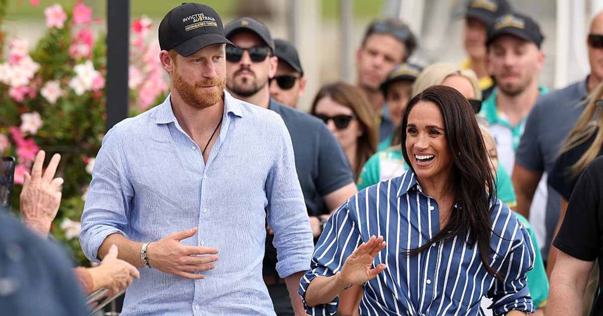 Sunbather goes viral for refusing to move as Prince Harry and Meghan Markle drew a crowd on Bondi Beach