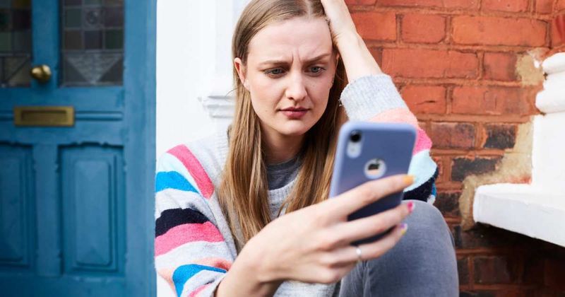He handed his phone to his crush's friend to take a photo of them. One accidental swipe had her chasing him down Broadway to confront him
